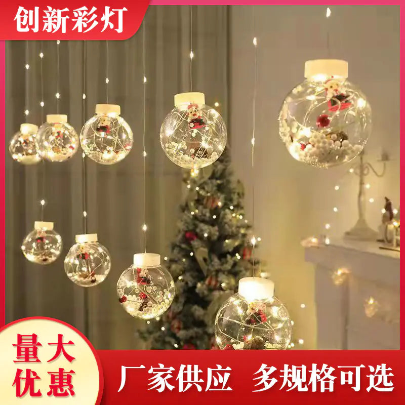 LED Holiday Curtain String Lights displayed in a festive room with Christmas tree and fireplace, highlighting multicolor globe ornaments and warm glow.