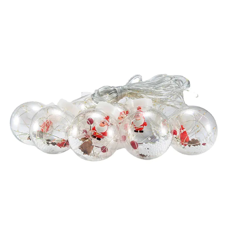 Set of LED Holiday Curtain String Lights with clear globe ornaments filled with red berries and snow, ideal for festive indoor or outdoor decoration.